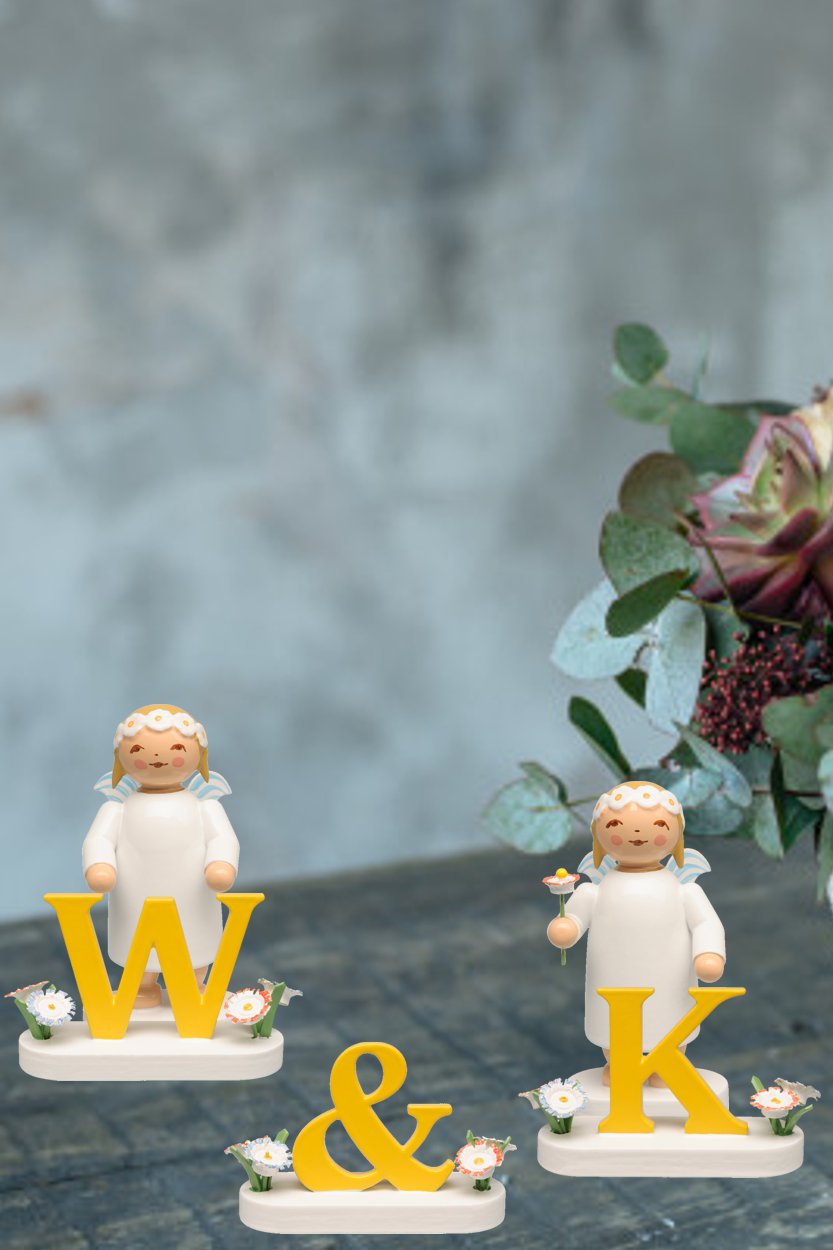 UND-Zeichen mit Blume für Buchstaben - Wendt & Kühn