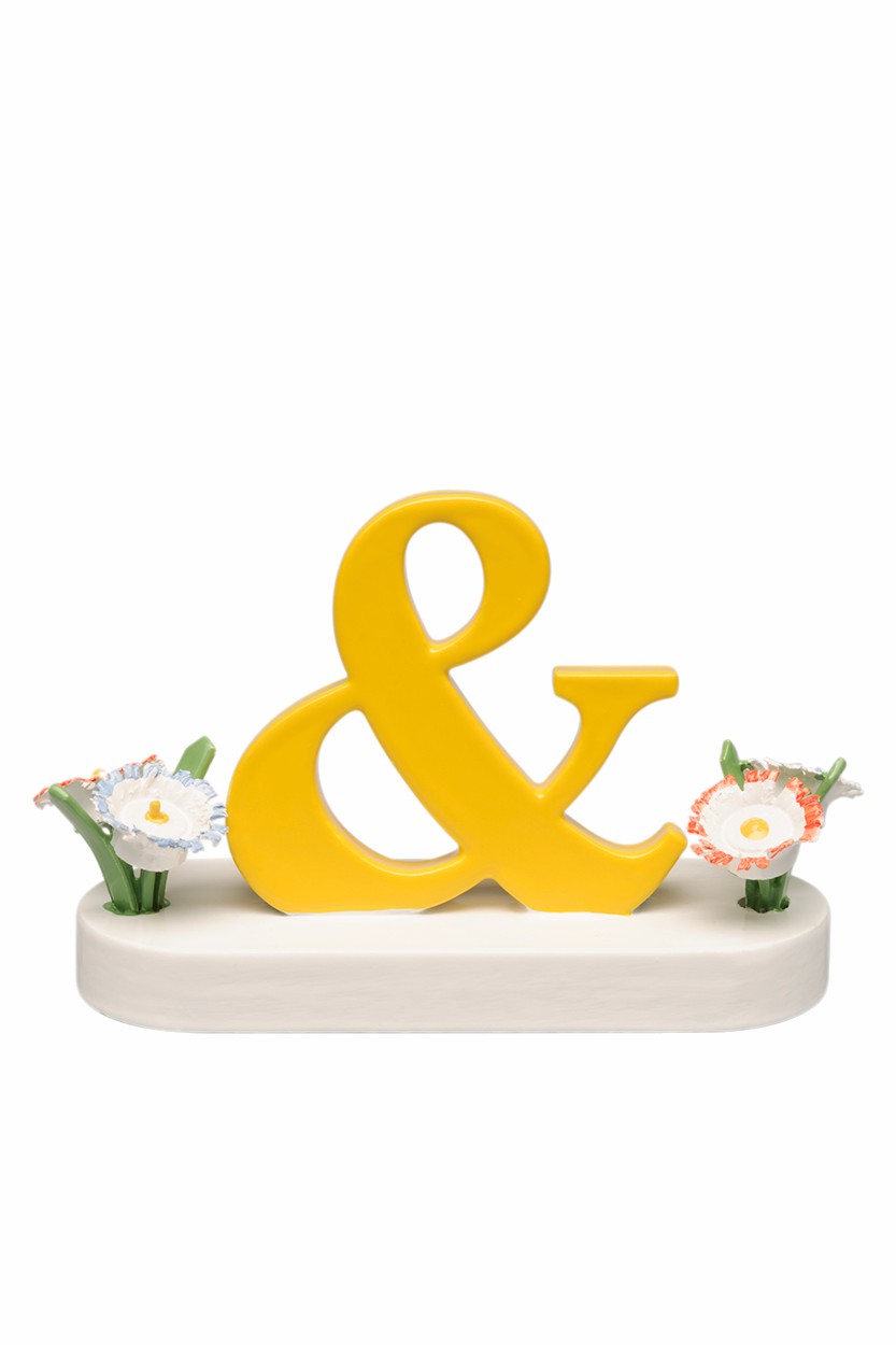 UND-Zeichen mit Blume für Buchstaben - Wendt & Kühn
