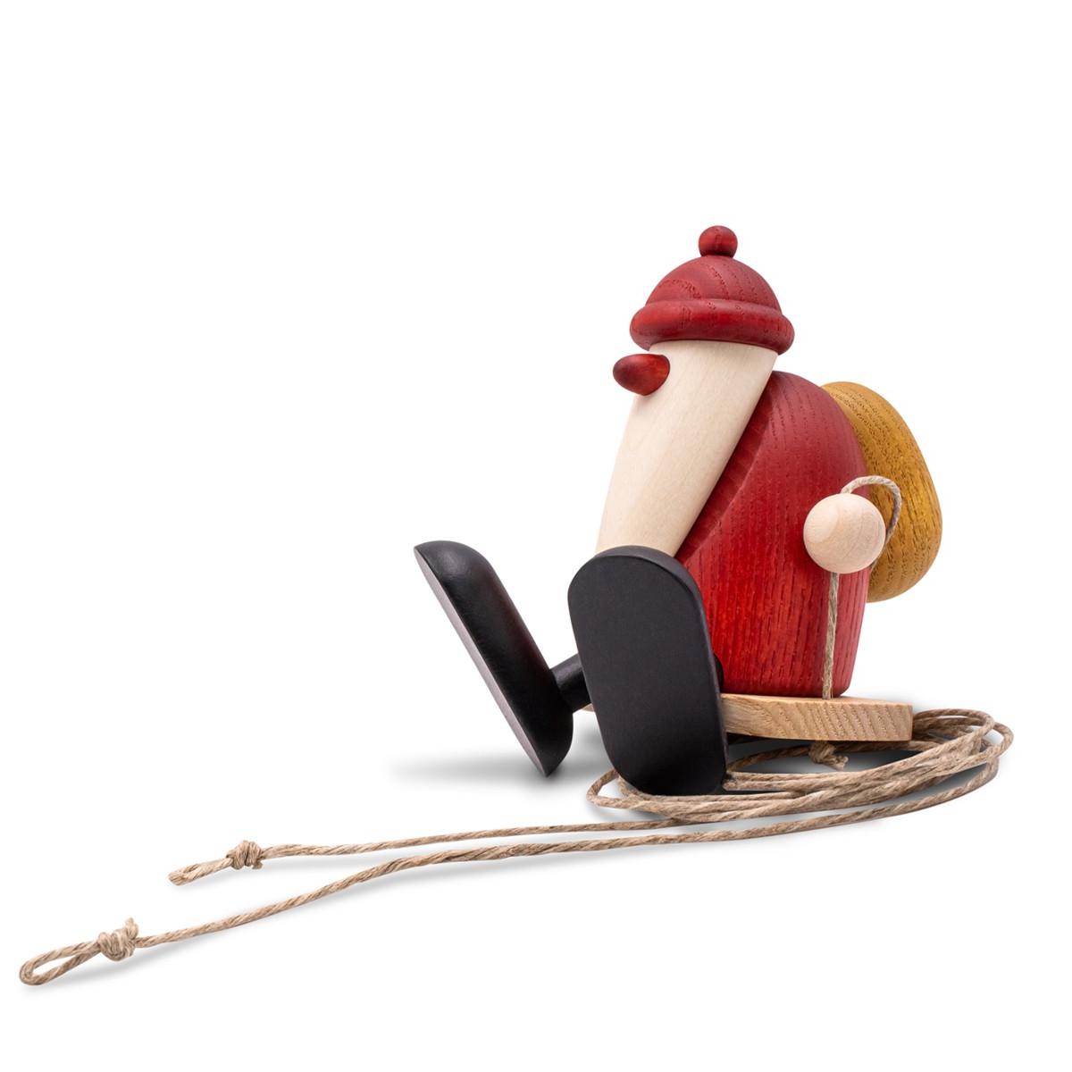 Weihnachtsmann auf Schaukel